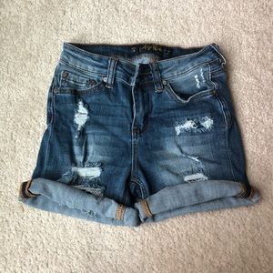 Destroyed denim shorts